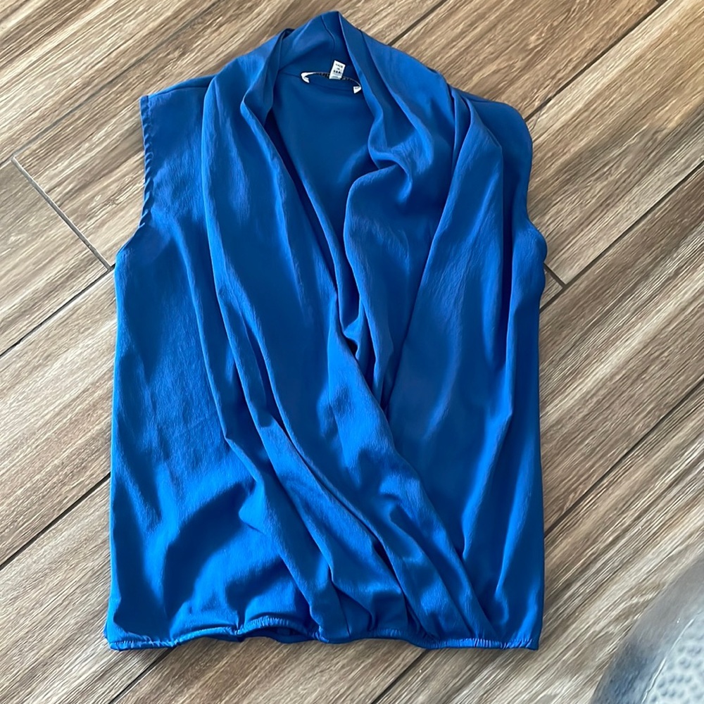 Cute blue blouse to wear with jeans or dress up.